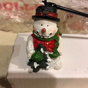 Holiday candle snuff. Brand new!